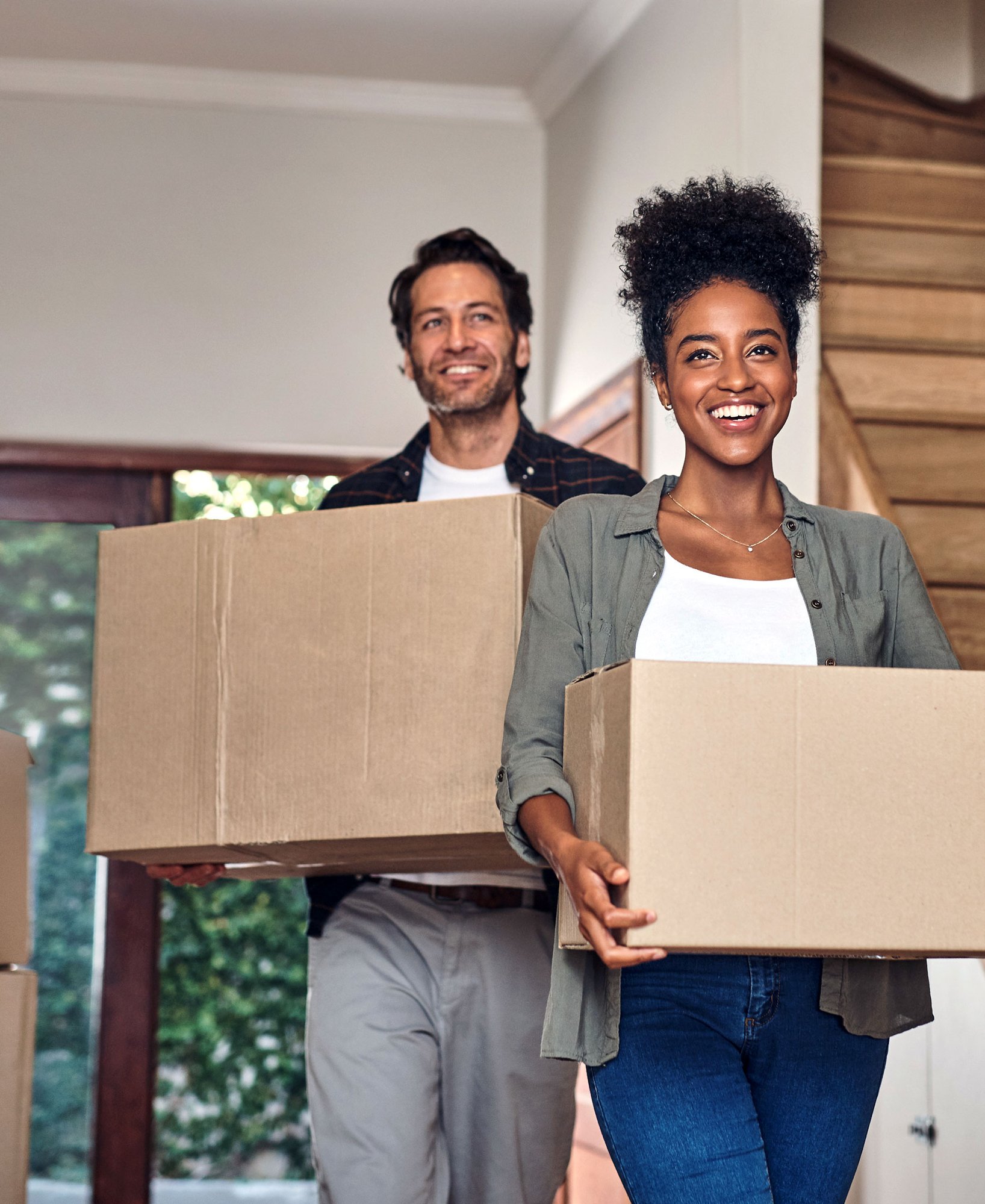 young-adult-couple-moving-into-home young-adult-couple-moving-into-home